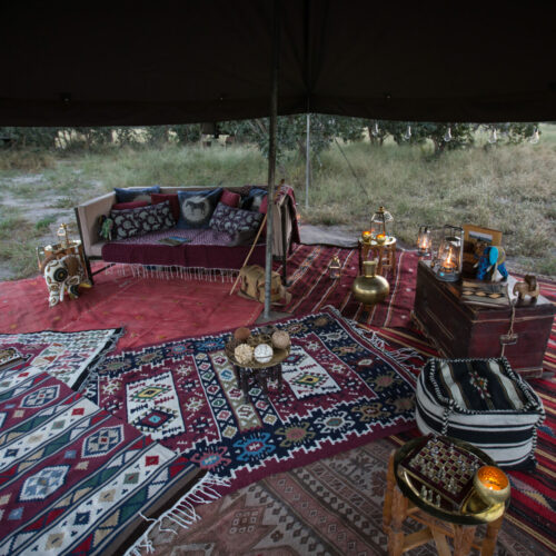 Golden Africa Safaris tented camp out in the bush with carpets and candles