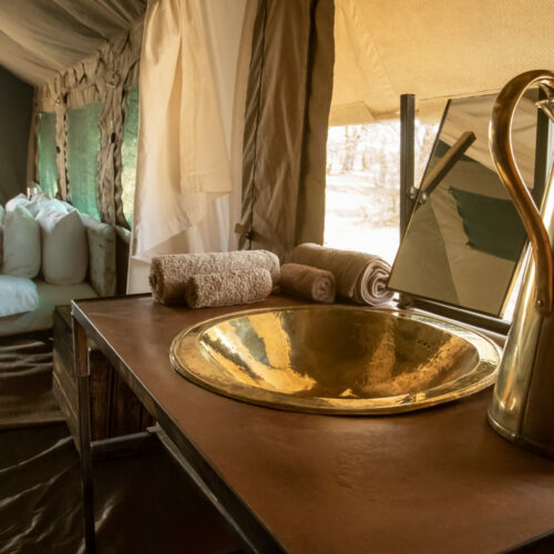a wash are on the inside of a tent on a Golden Africa Safari