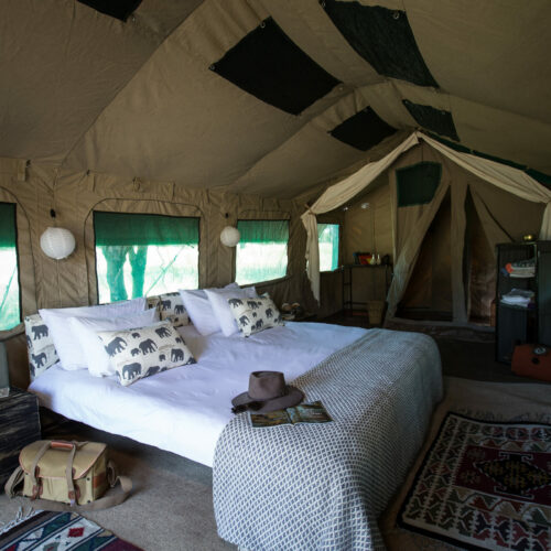 a bedroom inside the tent of a Golden Africa Safari