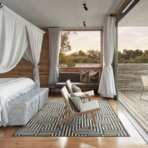 Bedroom and view from a Island Treehouse suites