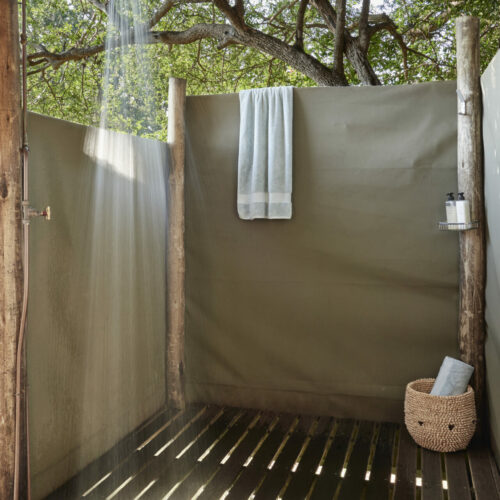 an outdoor shower at the Victoria Falls River Lodge
