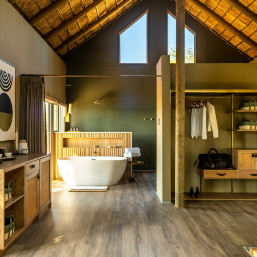interior of a bedroom at Victoria Falls River Lodge